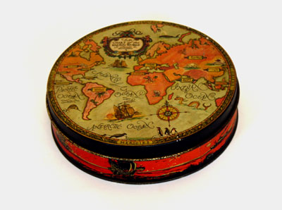 vintage cookie tin with world map printed on lid