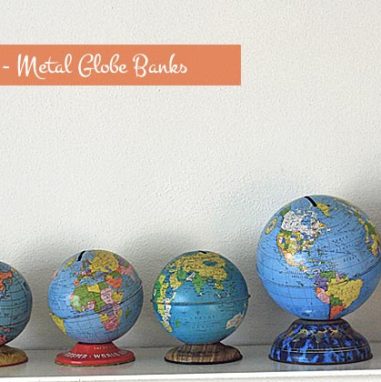 a quirky collection of tin globe banks