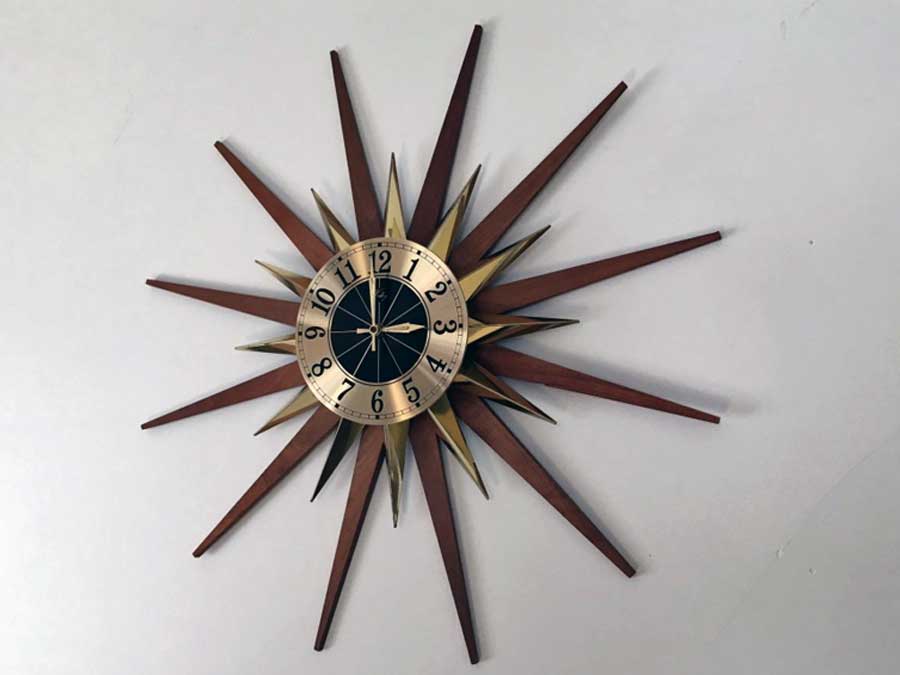 Mid century modern teak and brass Welby starburst wall clock