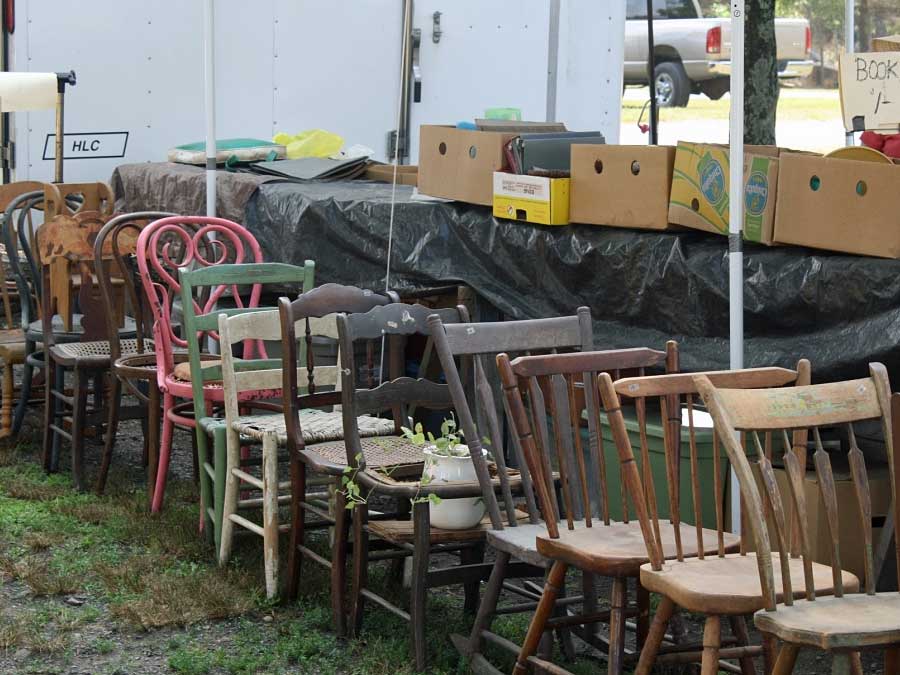 old chairs on display at flea market are good places to find vintage home decor