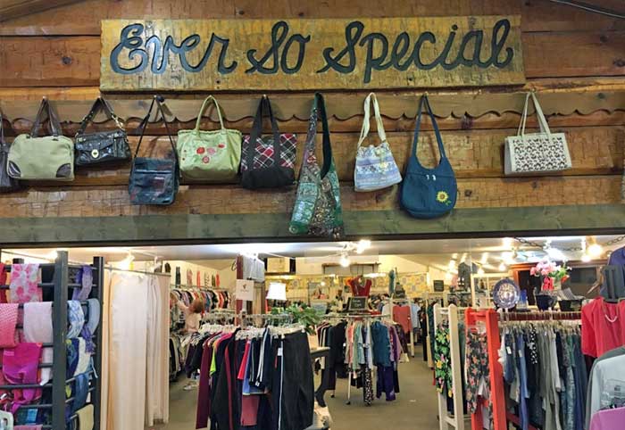 view of clothing racks inside Second Street Thrift Store in Denver PA