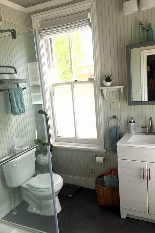 new bathroom sink and toilet in old house